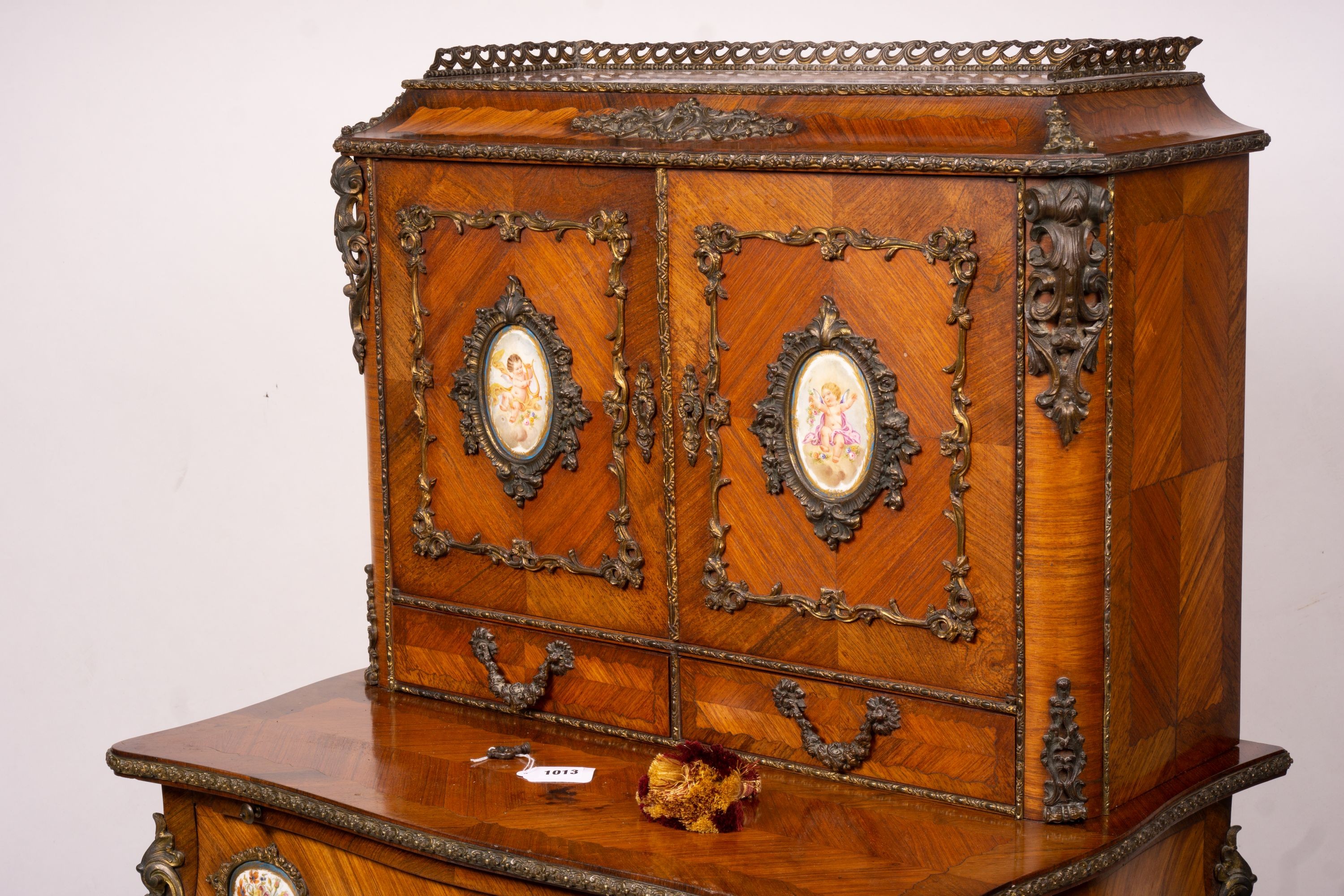 A late 19th century French gilt metal and porcelain mounted kingwood bonheur du jour, width 73cm, depth 50cm, height 128cm